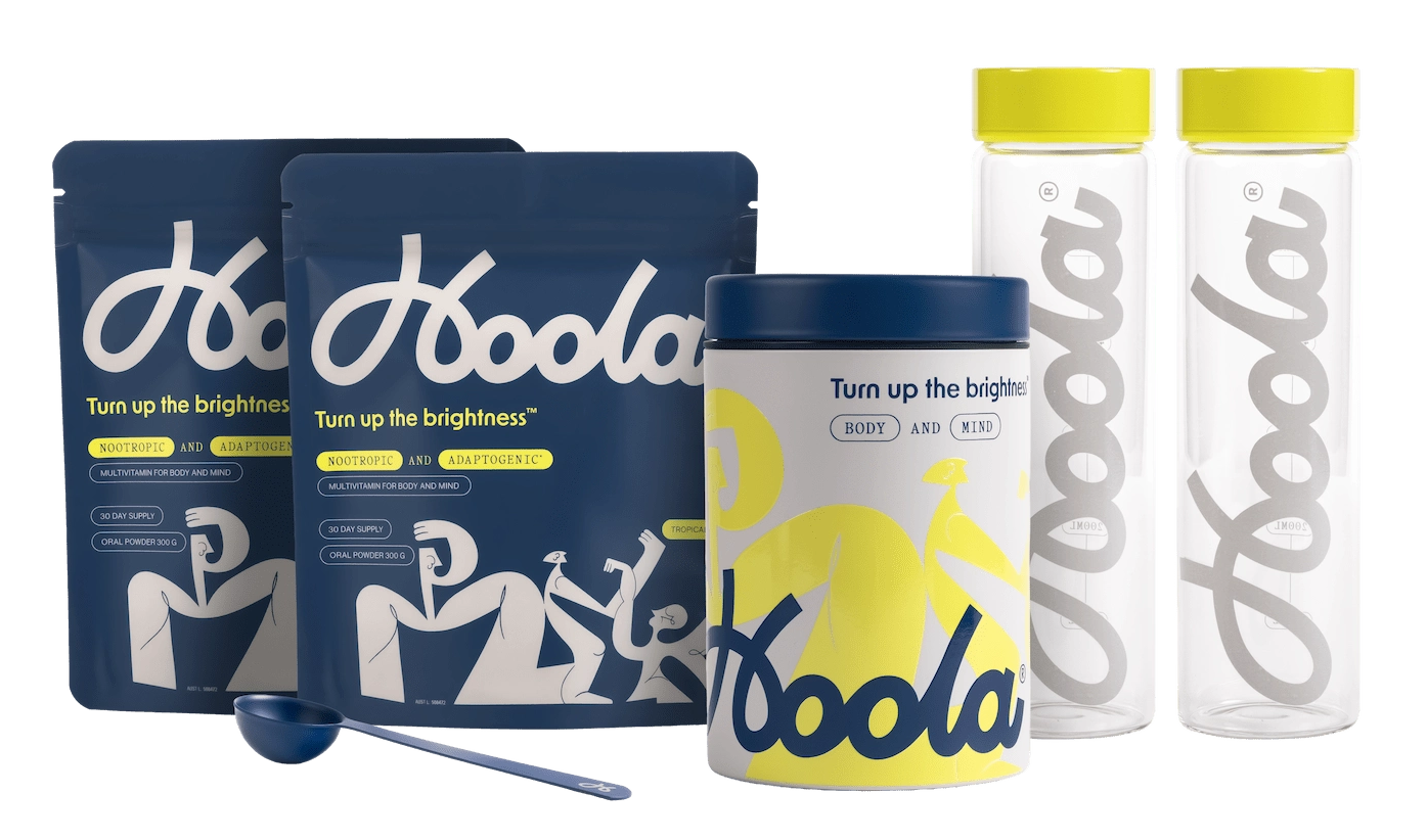 Hoola product packaging including bottles, containers, and packets on a white background